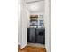 Well-lit laundry room featuring a modern washer and dryer set and charming decor at 3351 Creatwood Se Trl, Smyrna, GA 30080