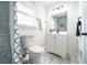 Bright bathroom featuring a white vanity, marble floors, and shower with modern fixtures at 4324 Rue Saint Michel, Stone Mountain, GA 30083