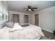 Bedroom with wood-look flooring, natural light, and closets, offering ample space and storage at 4324 Rue Saint Michel, Stone Mountain, GA 30083