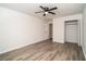 Spacious bedroom with wood-look flooring and closet, offering a comfortable retreat at 4324 Rue Saint Michel, Stone Mountain, GA 30083