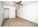 Bright bedroom featuring wood-look flooring and a closet, perfect for relaxation at 4324 Rue Saint Michel, Stone Mountain, GA 30083