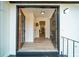 Inviting entryway featuring an open double door and modern lighting fixtures at 4324 Rue Saint Michel, Stone Mountain, GA 30083