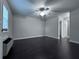 Bright bedroom with a ceiling fan and an open doorway at 4244 River Green Nw Dr # 111, Atlanta, GA 30327