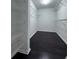 Walk-in closet with ample wire shelving and dark floors at 4244 River Green Nw Dr # 111, Atlanta, GA 30327