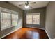 Bright bedroom featuring hardwood floors and large windows at 488 Morris Rd, Hiram, GA 30141