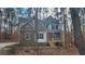 Charming two-story home with varied textures and a welcoming front porch at 488 Morris Rd, Hiram, GA 30141