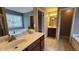 Main bathroom with tiled floors, double vanity, shower, and garden tub at 488 Morris Rd, Hiram, GA 30141