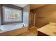 View of a bathroom featuring a garden tub, shower, and large window at 488 Morris Rd, Hiram, GA 30141