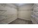 Walk-in closet with multiple shelves for storage at 488 Morris Rd, Hiram, GA 30141