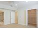 Bedroom featuring carpet, a ceiling fan, pot lights, ensuite and walk-in closet at 2322 Norbury Se Cv, Smyrna, GA 30080