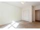 Cozy bedroom with neutral carpeting and a spacious closet at 2322 Norbury Se Cv, Smyrna, GA 30080