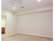 Carpeted bedroom with an ensuite bathroom and ceiling fan at 2322 Norbury Se Cv, Smyrna, GA 30080