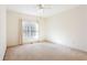 Bright bedroom with natural light from large window at 2322 Norbury Se Cv, Smyrna, GA 30080