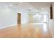 Spacious living room with hardwood floors, recessed lighting, and a ceiling fan at 2322 Norbury Se Cv, Smyrna, GA 30080