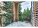 Private balcony offering a serene view of lush greenery and mature trees at 3777 Peachtree Ne Rd # 1324, Brookhaven, GA 30319