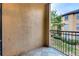 Apartment balcony showcasing stone floors and wrought iron railings at 3777 Peachtree Ne Rd # 1324, Brookhaven, GA 30319