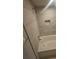 Bathroom features a tub, shower and granite tile walls at 3777 Peachtree Ne Rd # 1324, Brookhaven, GA 30319