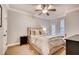 Serene bedroom featuring a comfortable bed, neutral tones, and ample natural light from the window at 3777 Peachtree Ne Rd # 1324, Brookhaven, GA 30319