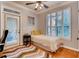 A bedroom with a twin bed, natural light, a modern desk and a comfortable work space at 3777 Peachtree Ne Rd # 1324, Brookhaven, GA 30319