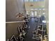 Well-equipped gym featuring weight machines, high ceilings, and elegant chandeliers at 3777 Peachtree Ne Rd # 1324, Brookhaven, GA 30319
