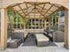 Outdoor lounge area with ample seating and shade in a community setting at 3777 Peachtree Ne Rd # 1324, Brookhaven, GA 30319