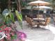 A beautifully designed patio with outdoor seating, surrounded by lush greenery at 3777 Peachtree Ne Rd # 1324, Brookhaven, GA 30319