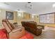 Finished basement with luxury recliner seating and a projection screen for a theater experience at 3739 Newhalem Sw St, Atlanta, GA 30331