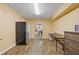 Basement with luxury vinyl flooring that can be used as a game area, and a utility area at 3739 Newhalem Sw St, Atlanta, GA 30331