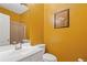 Bright bathroom featuring a wide mirror, a white sink, and neutral wall color at 3739 Newhalem Sw St, Atlanta, GA 30331