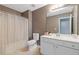 Bright bathroom with a white vanity, toilet, shower with white shower curtain at 3739 Newhalem Sw St, Atlanta, GA 30331