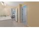 Clean bathroom with a view into the bedroom from an open doorway at 3739 Newhalem Sw St, Atlanta, GA 30331
