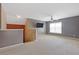 Neutral bonus room has a ceiling fan and a mounted television at 3739 Newhalem Sw St, Atlanta, GA 30331