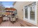 This deck offers a pleasant outdoor dining area with a table and chairs, perfect for relaxing outdoors at 3739 Newhalem Sw St, Atlanta, GA 30331