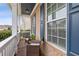 Charming front porch with seating, offering a view of the brick exterior and landscaped surroundings at 3739 Newhalem Sw St, Atlanta, GA 30331