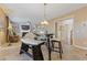 Eat-in kitchen featuring sleek black table set and tile flooring at 3739 Newhalem Sw St, Atlanta, GA 30331