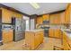 Spacious kitchen featuring stainless appliances and a central island at 3739 Newhalem Sw St, Atlanta, GA 30331