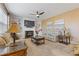 Bright living room with fireplace, built-ins, and neutral decor at 3739 Newhalem Sw St, Atlanta, GA 30331