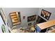 Aerial view of hallway with stair lift, artwork, and wood staircase at 1026 Riverbend Club Se Dr, Atlanta, GA 30339