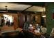 Eclectic living room with wood paneling and mirrored wall at 1026 Riverbend Club Se Dr, Atlanta, GA 30339