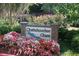 Community sign for Chattahoochee Chase with beautiful flowers and landscaping at 1026 Riverbend Club Se Dr, Atlanta, GA 30339