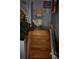 Installed stair lift on wooden stairs with decorative carvings for easy access at 1026 Riverbend Club Se Dr, Atlanta, GA 30339