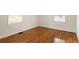 Bright room featuring windows and beautiful, shiny hardwood floors at 2413 Hillside Ave, Decatur, GA 30032