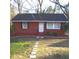 Charming brick home featuring a well-maintained front yard and inviting walkway at 2413 Hillside Ave, Decatur, GA 30032