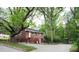 Brick home with a fenced backyard providing a secure and private outdoor space, with driveway at 2413 Hillside Ave, Decatur, GA 30032