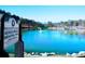 Picturesque lake scene at Barker Bryant Memorial Park with fountain and park signage at 2413 Hillside Ave, Decatur, GA 30032