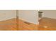 Hardwood floors in this Living Room lead to the kitchen and hallway to the bedrooms at 2413 Hillside Ave, Decatur, GA 30032