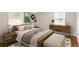 This staged bedroom has a comfortable bed, side tables, and a dresser at 2413 Hillside Ave, Decatur, GA 30032