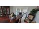 Dining room showcasing a dark wood table, decorative accents, and an open view to the living room at 2453 Wall Se St, Conyers, GA 30013
