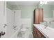 Bathroom featuring a toilet, bathtub, vanity, and wood cabinet at 2826 Summit Ridge Dr, Marietta, GA 30066
