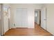 Bedroom featuring hardwood floors, window, and neutral wall color at 2826 Summit Ridge Dr, Marietta, GA 30066